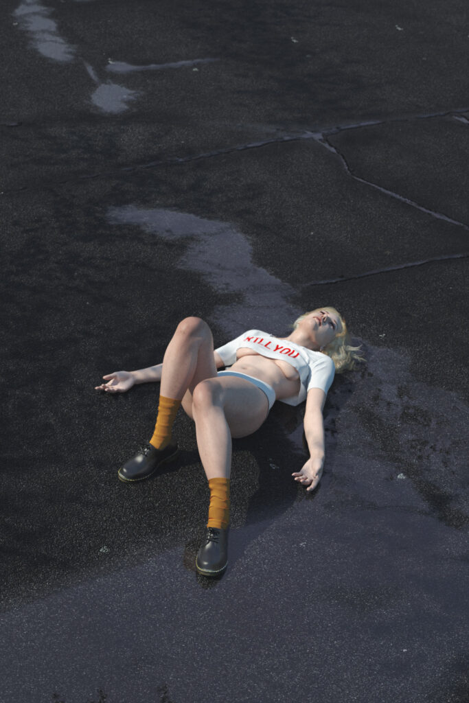 A woman with blonde hair lies on a wet asphalt road wearing a white crop top with red text yellow socks and black shoes.